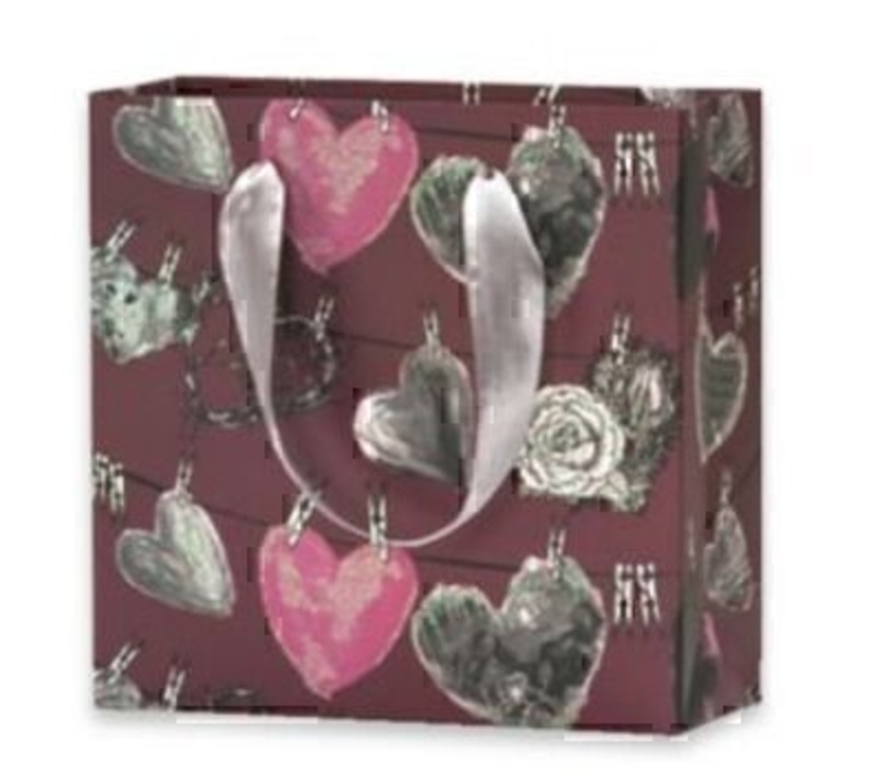 Small Hearts on Washing Line Gift Bag Vallila Hehku by Stewo. This quality gift bag by Swiss designers Stewo will not disappoint. It has all the quality and detailing you would expect from Stewo. This gift bag is made from thick card. With colour co-o